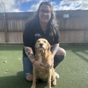 Staff member with dog
